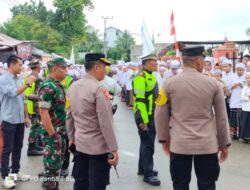 Personel Polres Pidie Jaya Amankan Kampanye Cawapres Nomor Urut 1