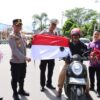 Polres Aceh Tengah dan Bhayangkari Bagikan Bendera Merah Putih Gratis Sambut HUT RI ke-80