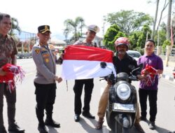 Polres Aceh Tengah dan Bhayangkari Bagikan Bendera Merah Putih Gratis Sambut HUT RI ke-80