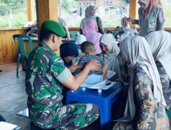 Satgas TMMD dan Dinas Kesehatan Gelar Pendampingan Posyandu di Desa Gelampang Gading