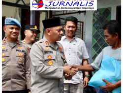 Kapolres Pelabuhan Belawan Beri Bantuan Sembako untuk Warga Terdampak Banjir Rob