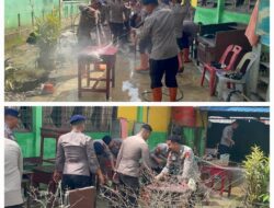Brimob Polda Sumut Turun Tangan Bersihkan SMP Negeri 1 Tanjung Pura Pasca Banjir