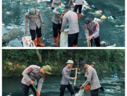 Peduli Lingkungan, Brimob Polda Sumut Angkat Sampah dari Sungai Demi Warga