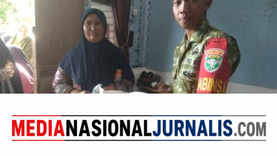 Babinsa Koramil 01/Lut Tawar Dampingi Penyaluran Bantuan Pangan di Desa Rawe