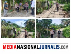 Polri Hadir di Tengah Masyarakat, Kapolsek Padang Tualang Patroli Jembatan Darurat Bukit Lawang Tangkahan