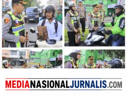 Kapolres Langkat Beri Bingkisan untuk Pegendara yang Tertib Berlalu Lintas