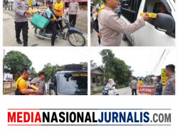 Jum’at Berkah, Polisi Bagikan Nasi Kotak Kepada masyarakat Bahorok