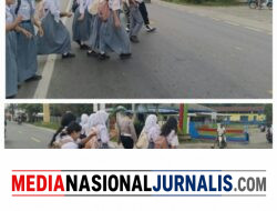 Pengaturan Lalu-lintas pagi hari memberikan pelayanan kepada anak-anak Sekolah dan masyarakat Pengguna Jalan.