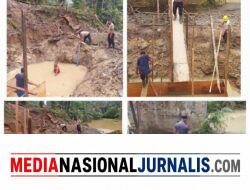 Pastikan Pembangunan Berjalan, Polsek Salapian Monitoring Jembatan Merah Putih