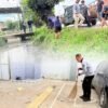 *Dalam rangka Hari Bakti KEMENIPAS yang ke 2 Tahun 2026 Rutan Tanjung Pura Gelar Gotong Royong Bersihkan Saluran Air dan Tembok Luar Guna Cegah Banjir di Musim Penghujan*